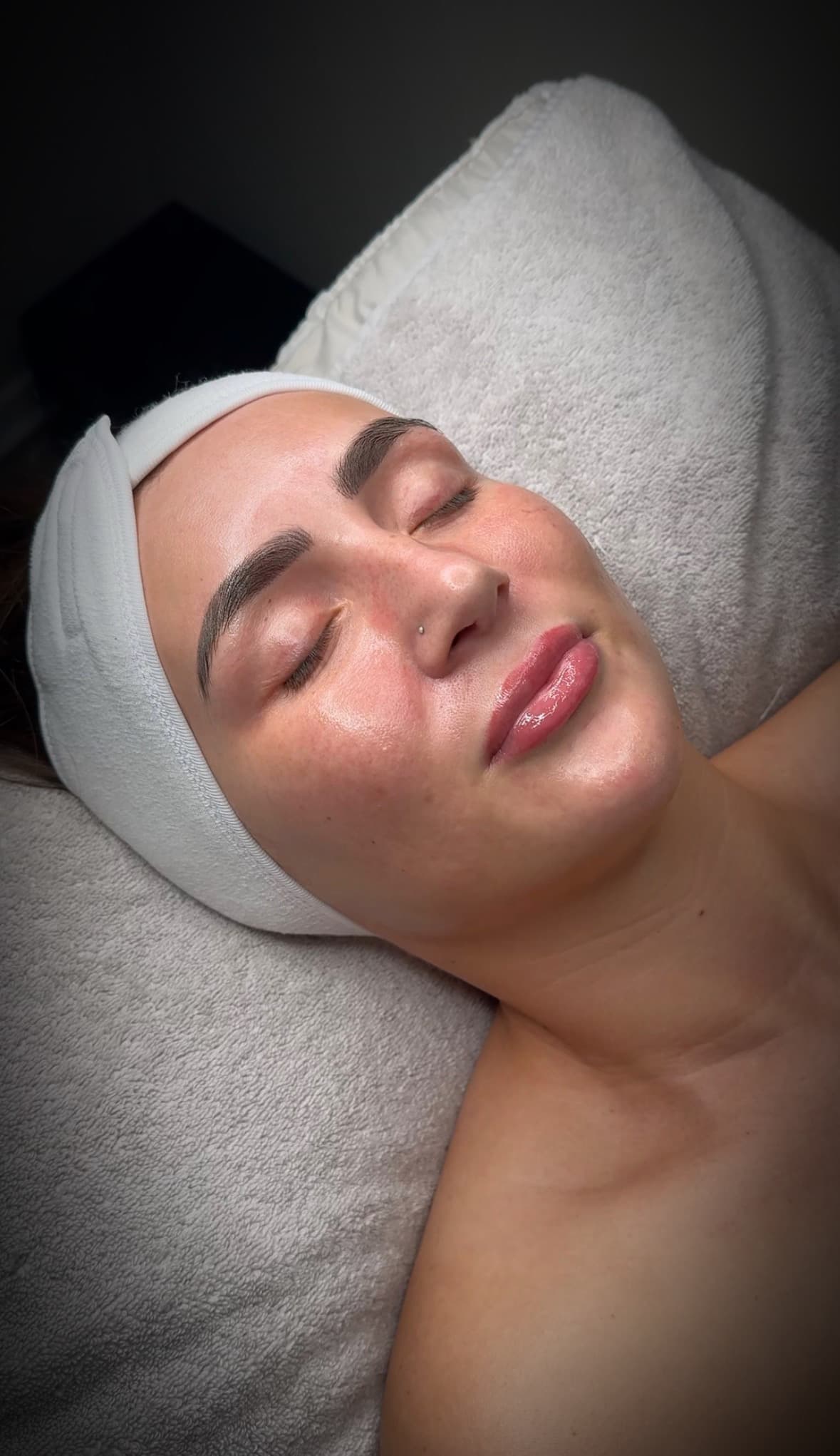 Client relaxing during a wellness appointment at Darling